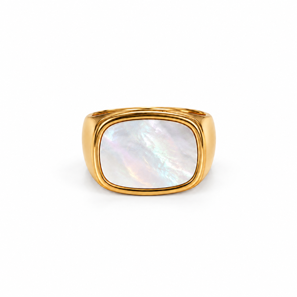 Gabriel gold signet ring with white shell inset on a white background